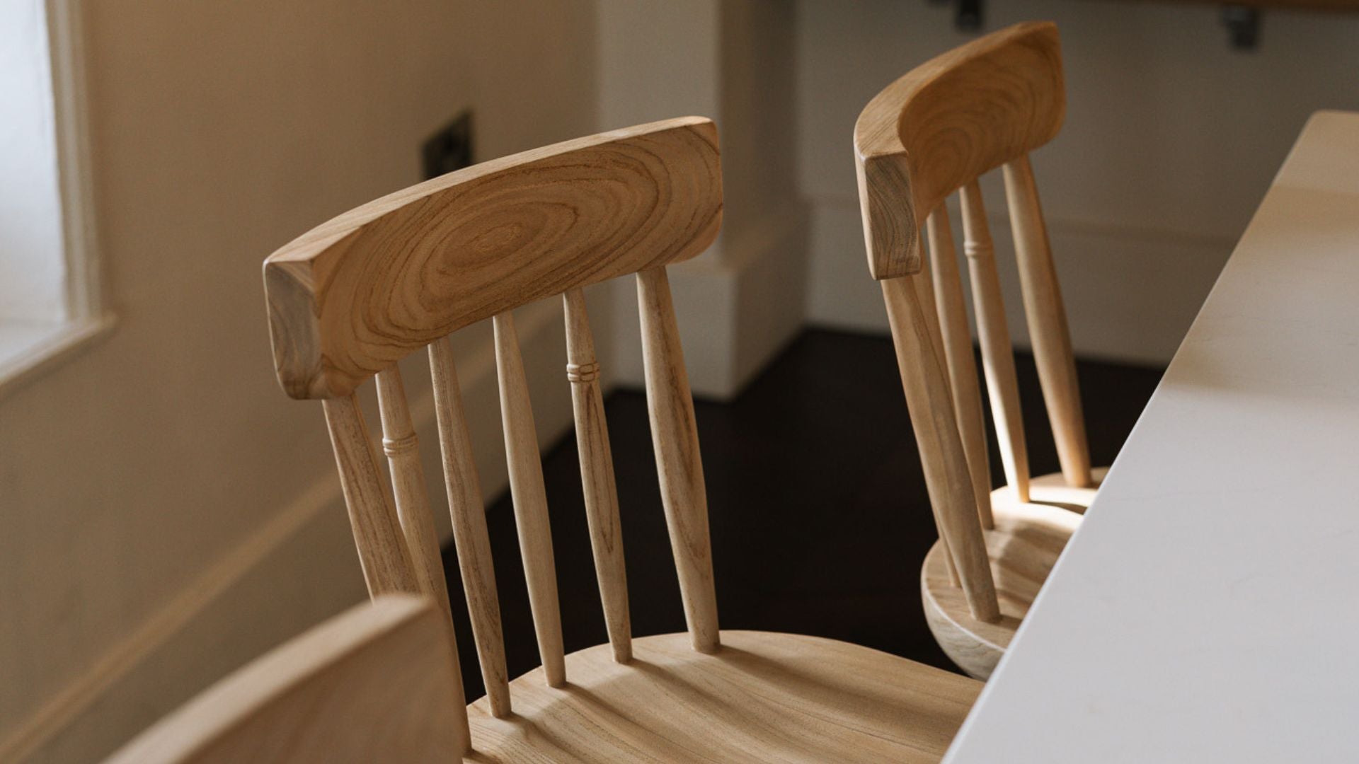 Farmhouse wooden bar stools at kitchen island