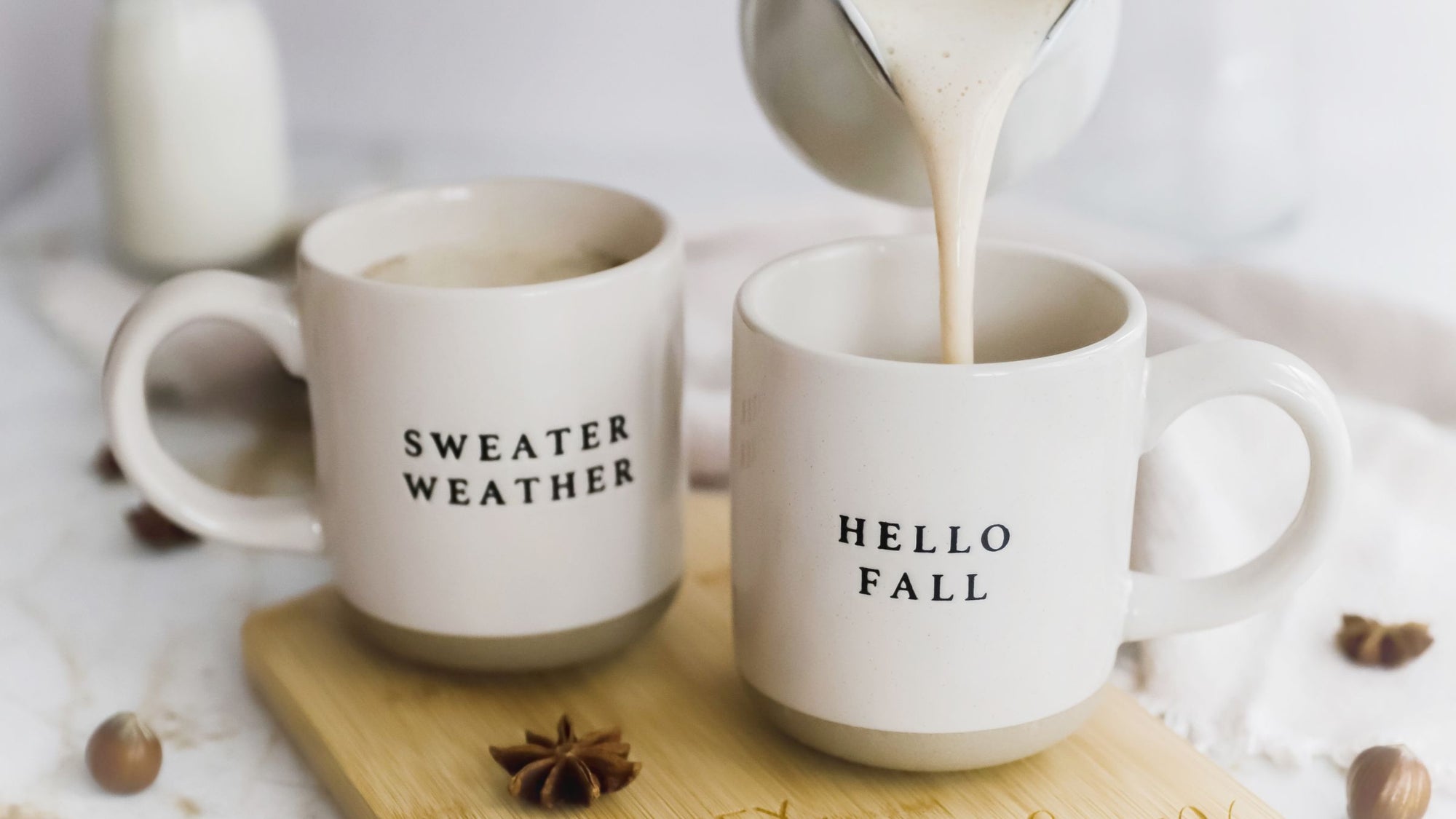 Pumpkin spiced latte recipe in autumn mugs.