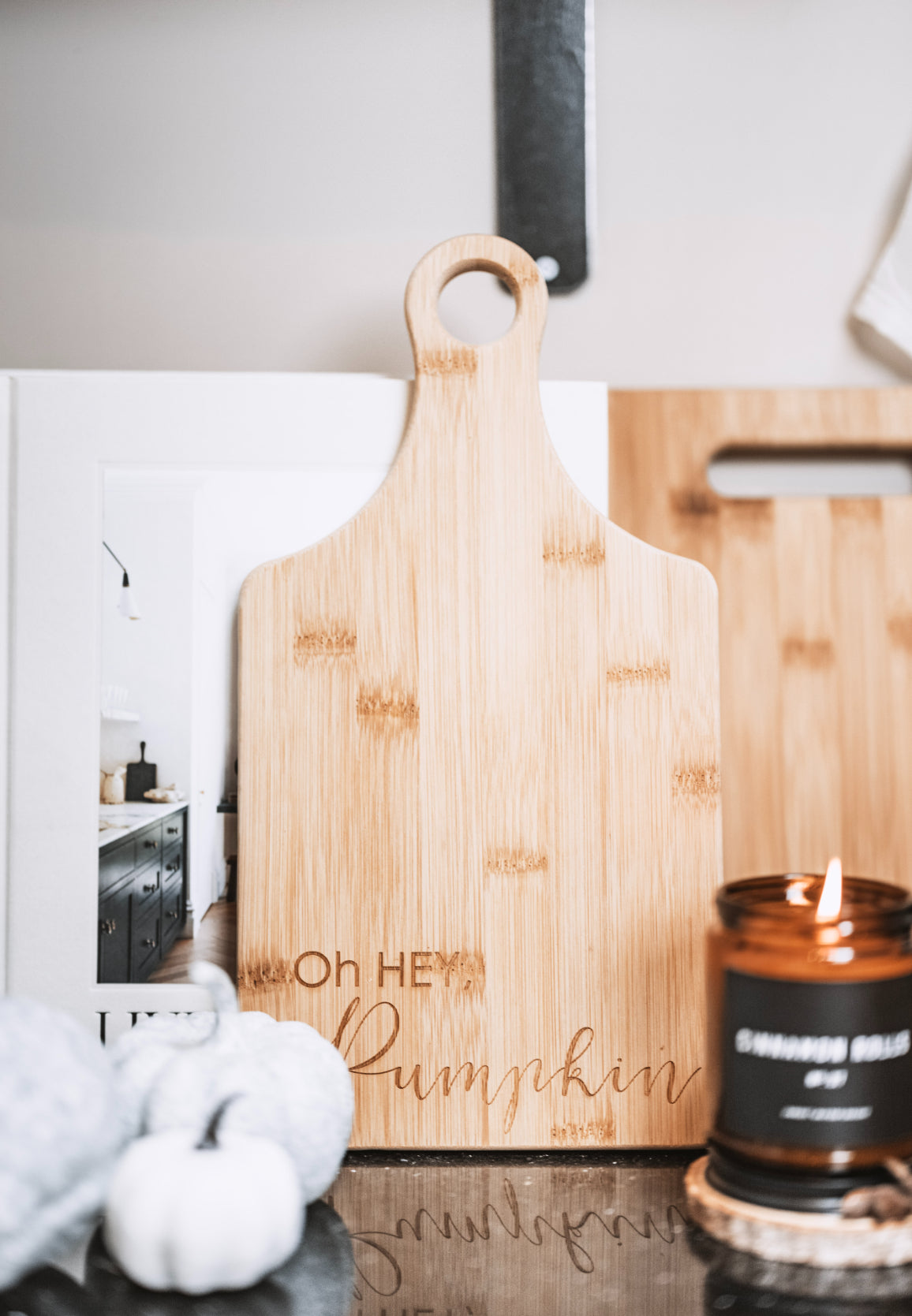 Bamboo wooden board with 'hey pumpkin' engraving.