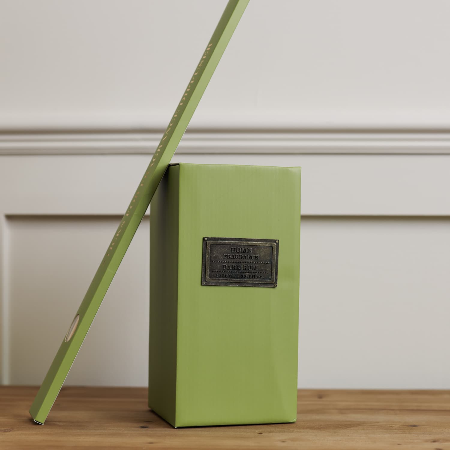 Home fragrance dark rum and lime green reed diffuser presentation box