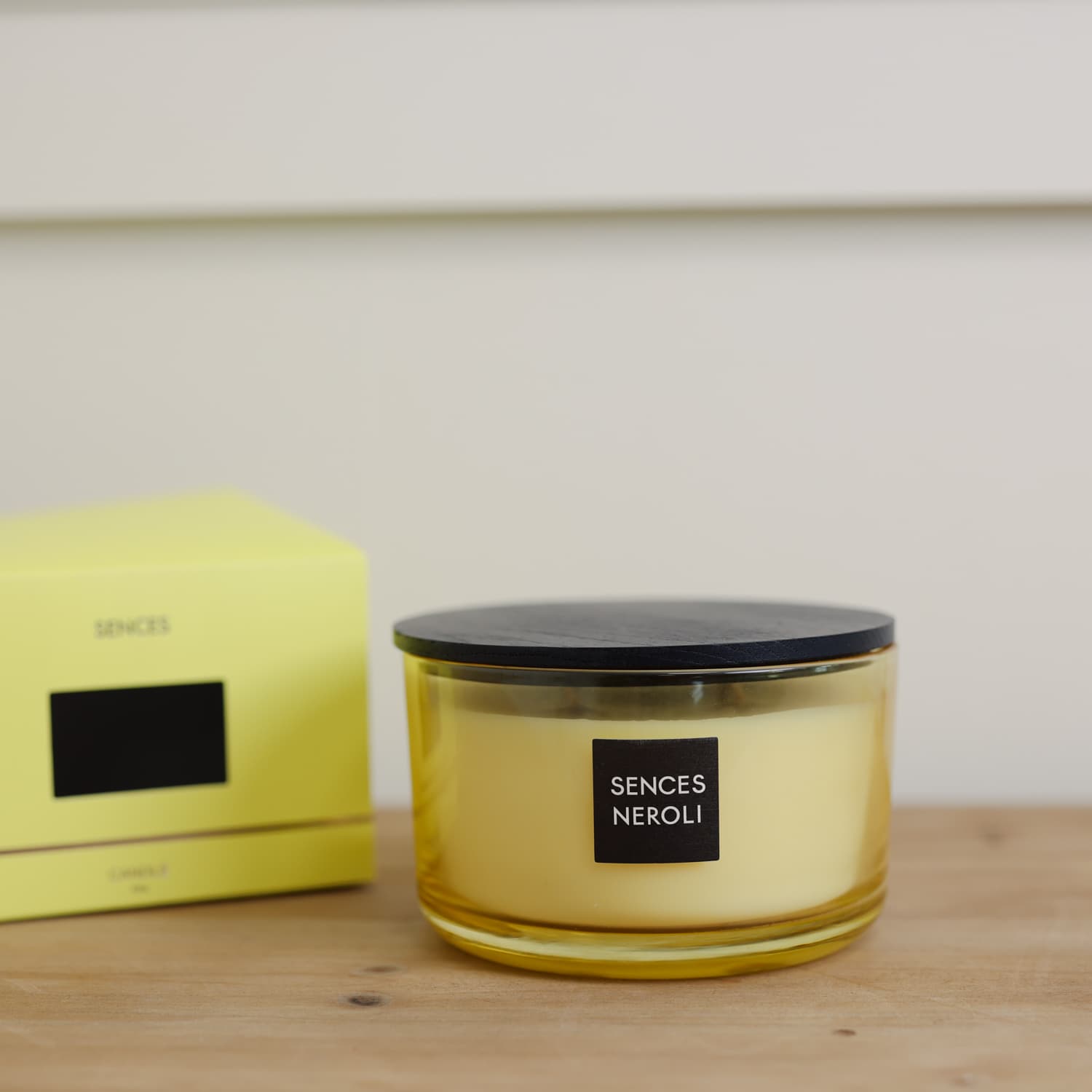 Sences Neroli Lidded Candle with lid on and presentation box in background.
