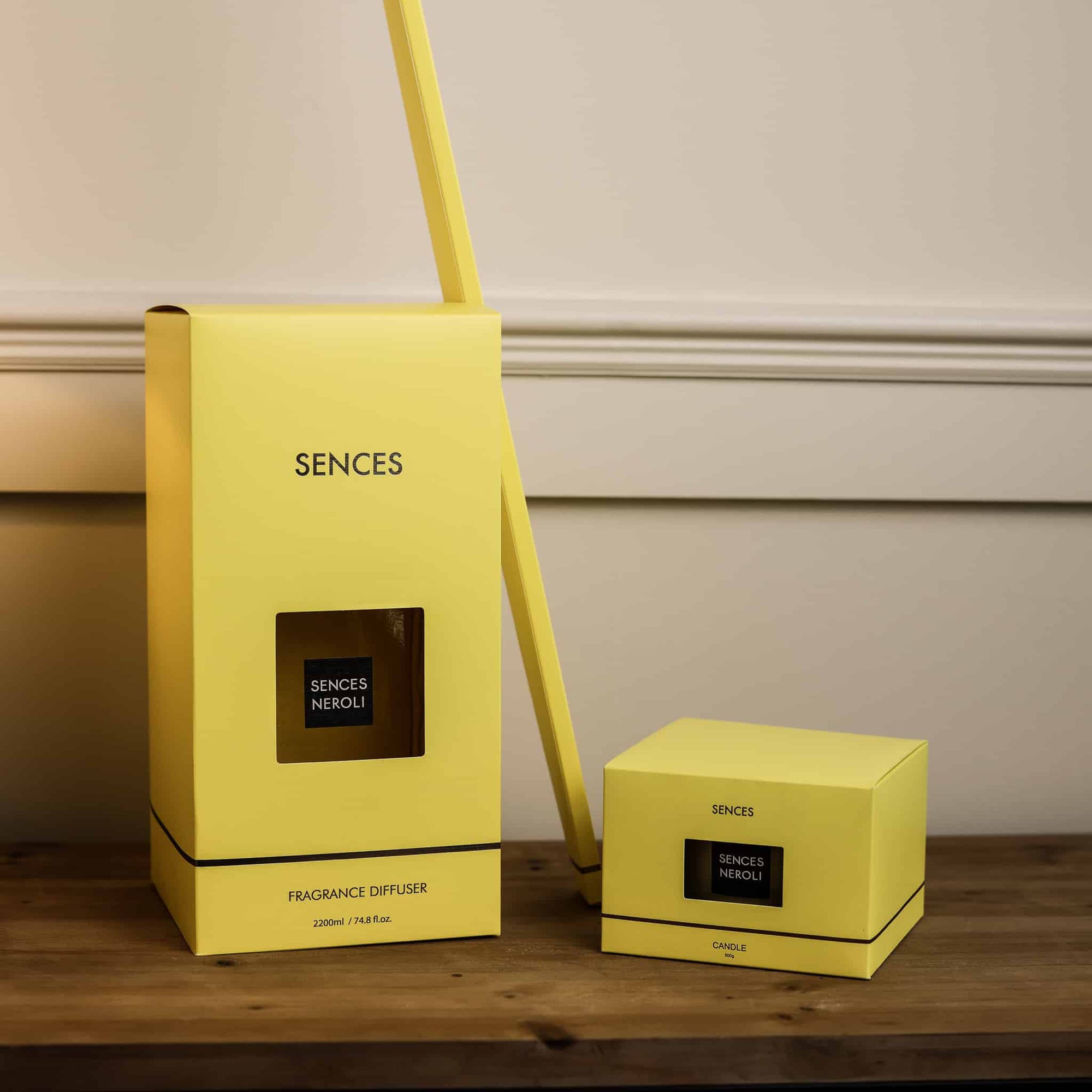 Sences Neroli Extra Large Reed Diffuser and candle in yellow presentation boxes.