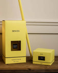 Sences Neroli Extra Large Reed Diffuser and candle in yellow presentation boxes.