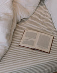 Striped Fitted Sheet with open book.