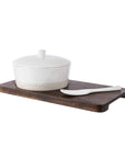 Stoneware Cheese Baker Set on wooden paddle.