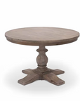 Natural pine round dining table with one round chunky leg, product image.