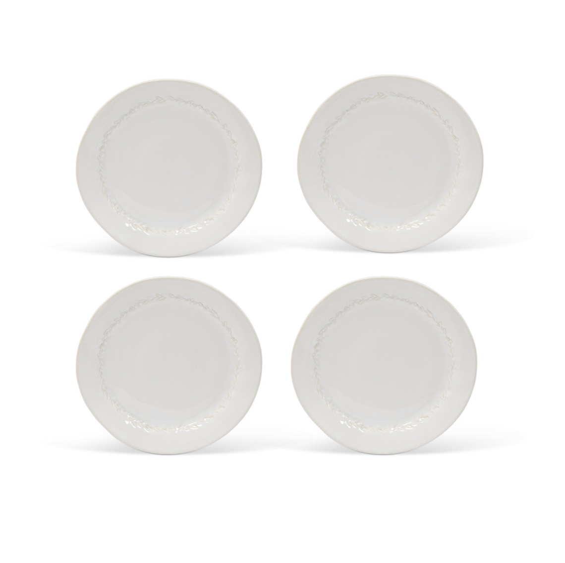 Set of 4 white dinner plates with leaf detaillng.