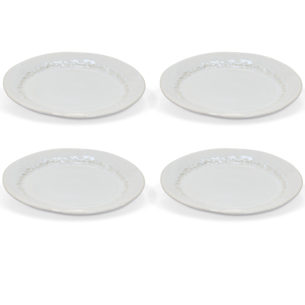 Set of 4 white dinner plates with leaf detailing.