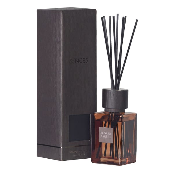 Amber mini reed diffuser with presentation box.