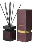 Burgundy reed diffuser with presentation box.