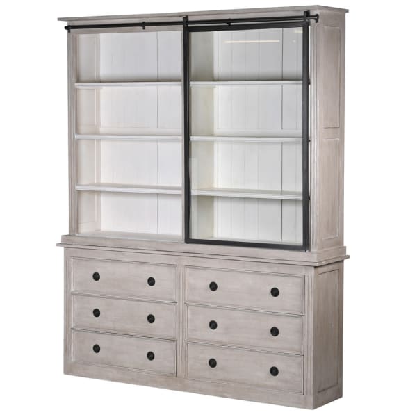 6 drawer white washed storage cabinet with iron hardware and glass sliding door, slid to the right.