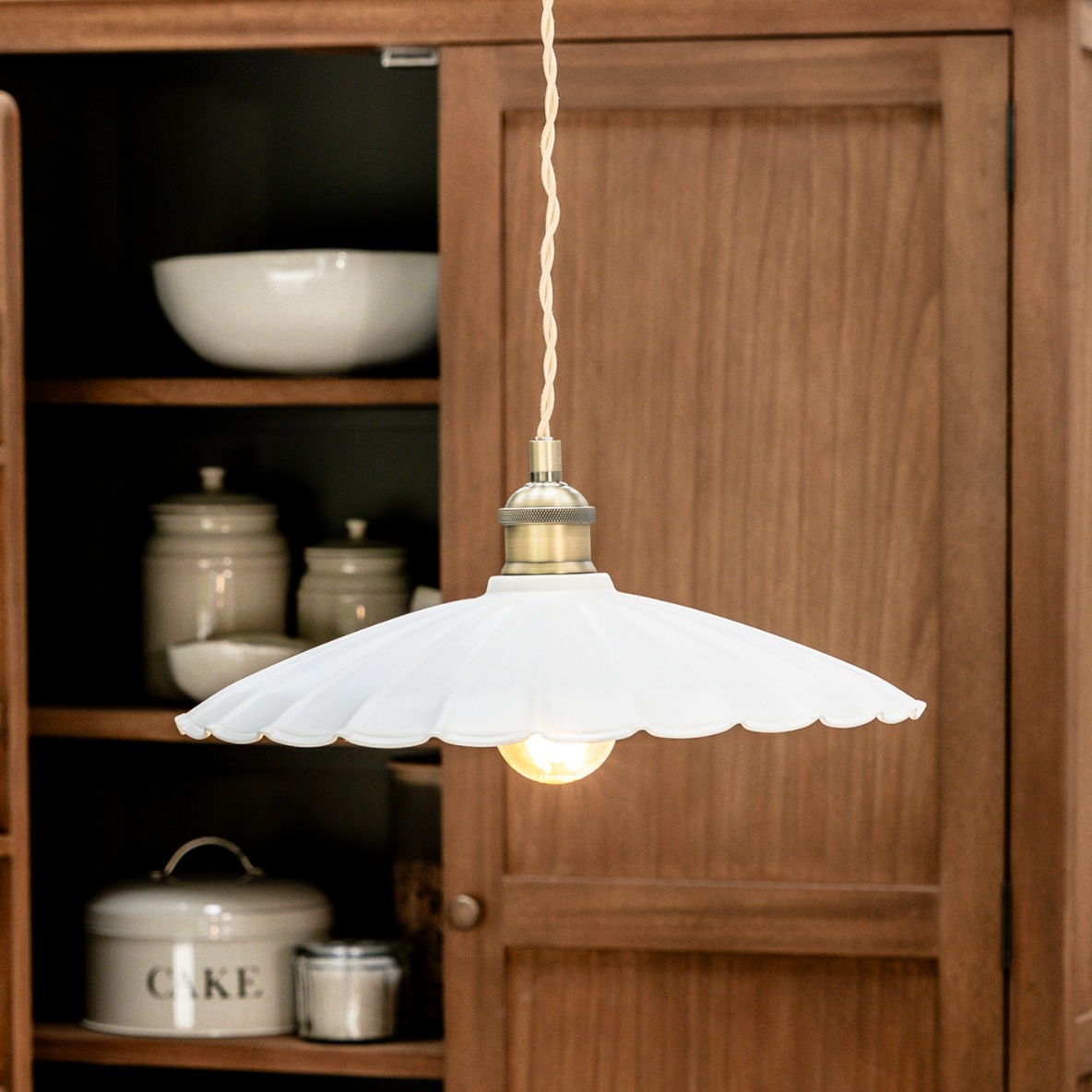 White ceramic fluted pendant light.