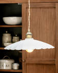 White ceramic fluted pendant light.