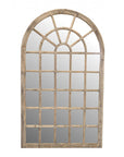 Tall arch mirror with wooden frame and panelling front view.