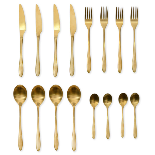 16 piece brass cutlery set laid out.