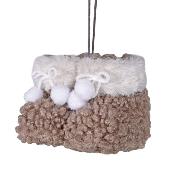 Hanging decoration of brown and white furry booties. 