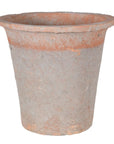 Red antiqued stone plant pot.