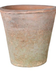 Red antiqued stone plant pot.