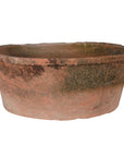 Antiqued red stone planter.