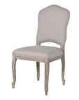 French stone coloured upholstered dining chair.