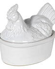 White ceramic hen egg holder.