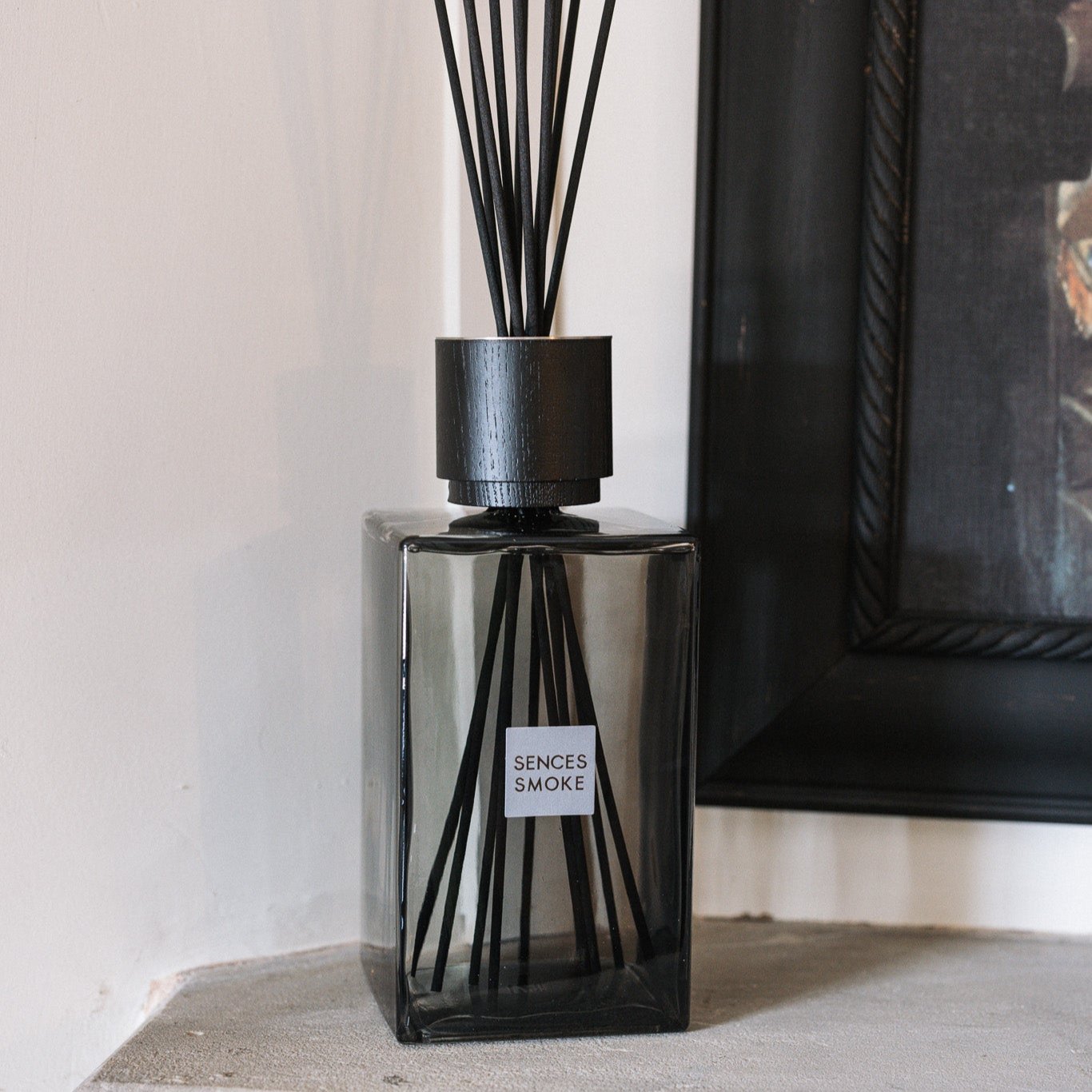 Extra large grey sences reed diffuser on stone mantle.