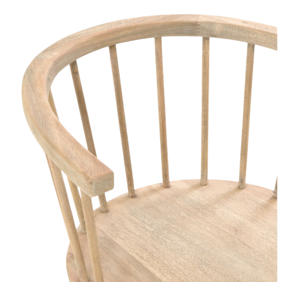 Curved back of wooden vintage carver chair.