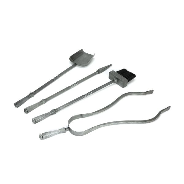 4 fireside tools from companion set in pewter. 