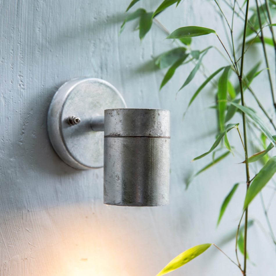 Galvanised Down Light on plaster wall.