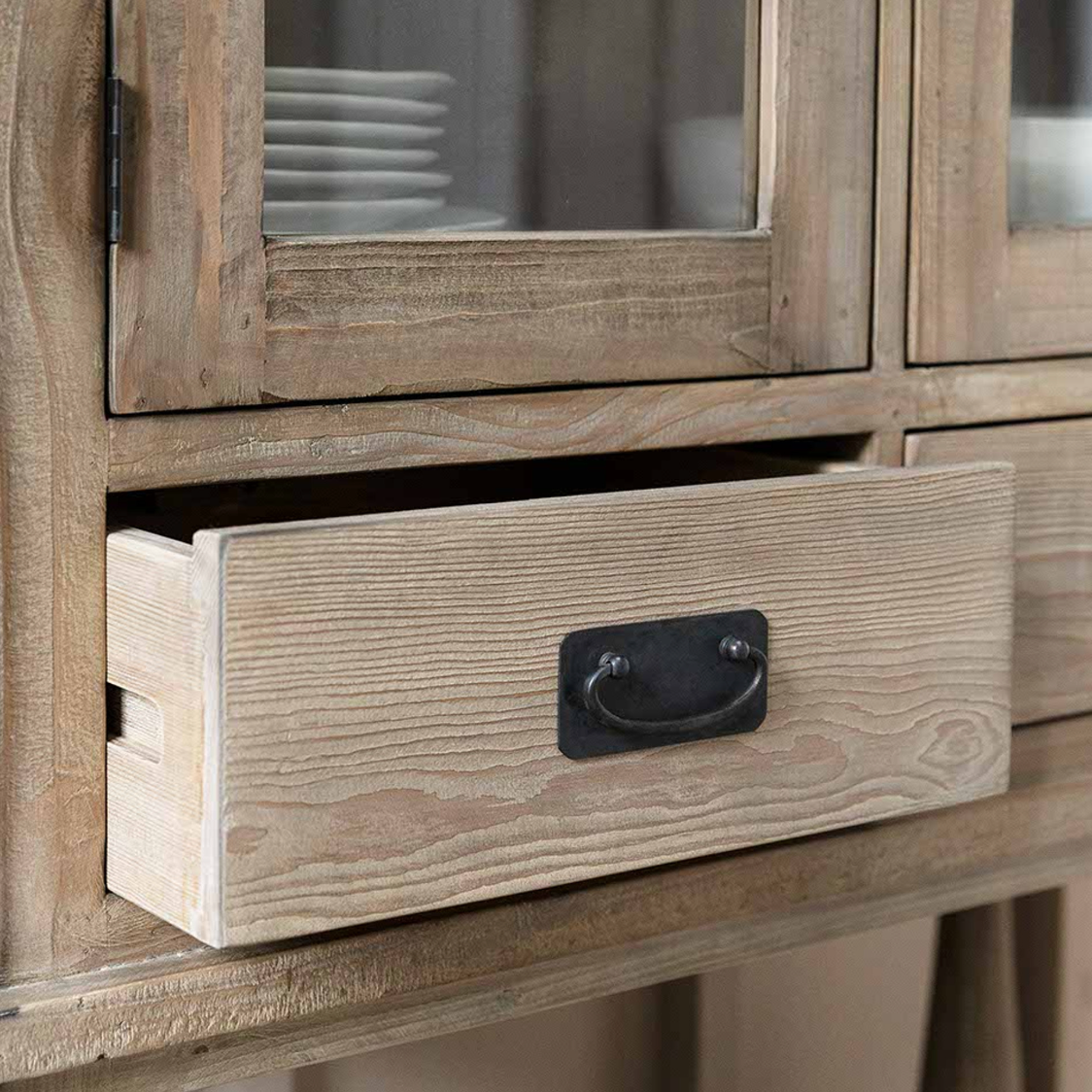 the open drawer on Glass Display Cabinet.