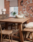 Elm dining table with chairs and bobble bowl.