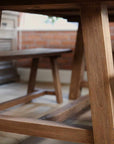 Elm dining table close up of legs.