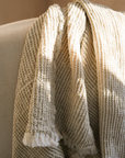 Close up of natural waffle throw.