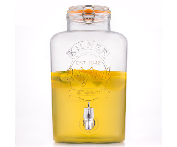 Kilner 8 litre drink dispenser with orange juice.