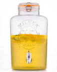 Kilner 8 litre drink dispenser with orange juice.