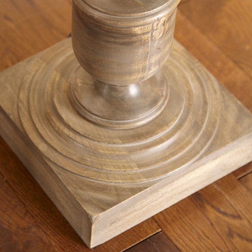 Close up of wooden lamp base.