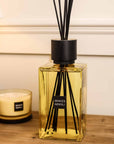 Sences Neroli Extra Large Reed Diffuser on wooden console with matching candle.