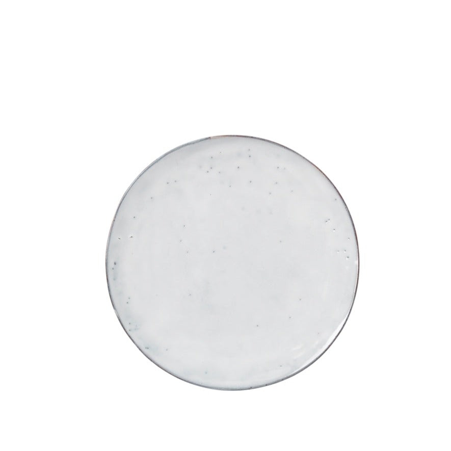 Off white speckle glazed dinner plate, face view.