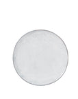 Off white speckle glazed dinner plate, face view.