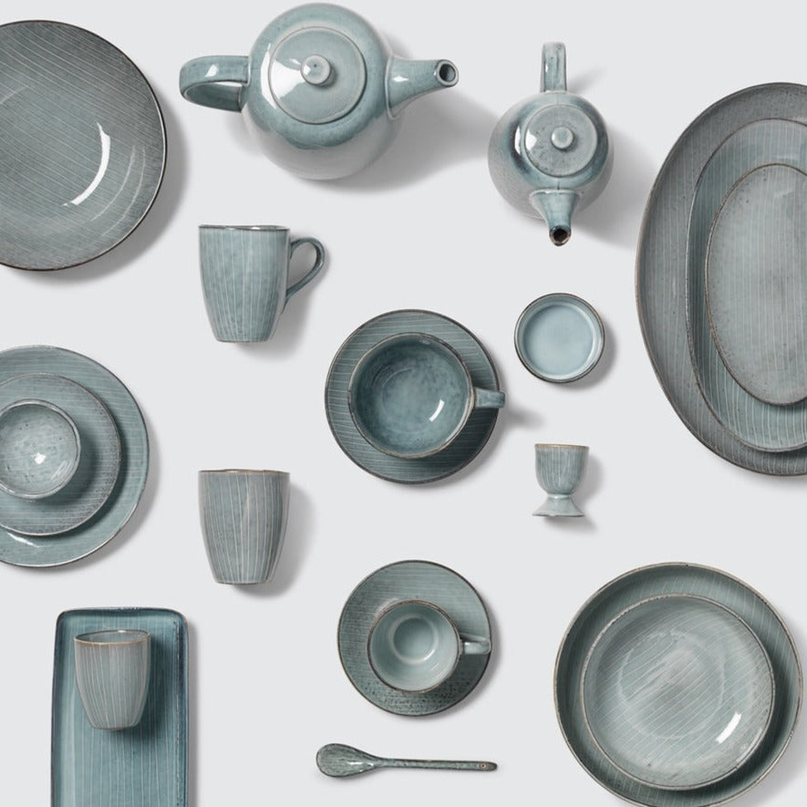 Blue glazed full dinnerware set.