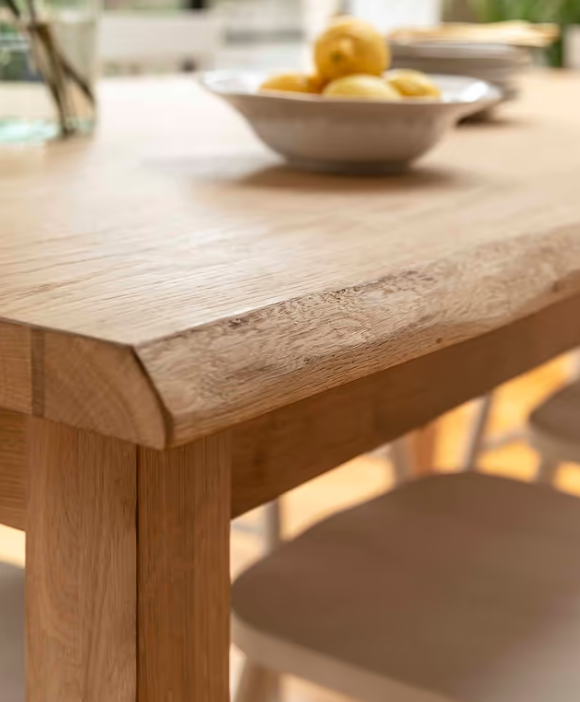 Close up of tabletop on oak dining table