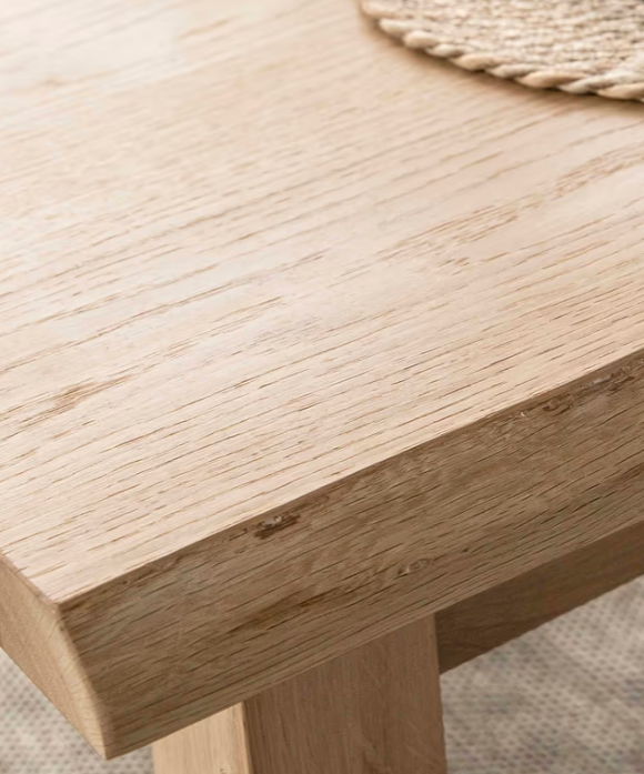 Close up of natural grain on oak dining table.