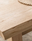 Close up of natural grain on oak dining table.