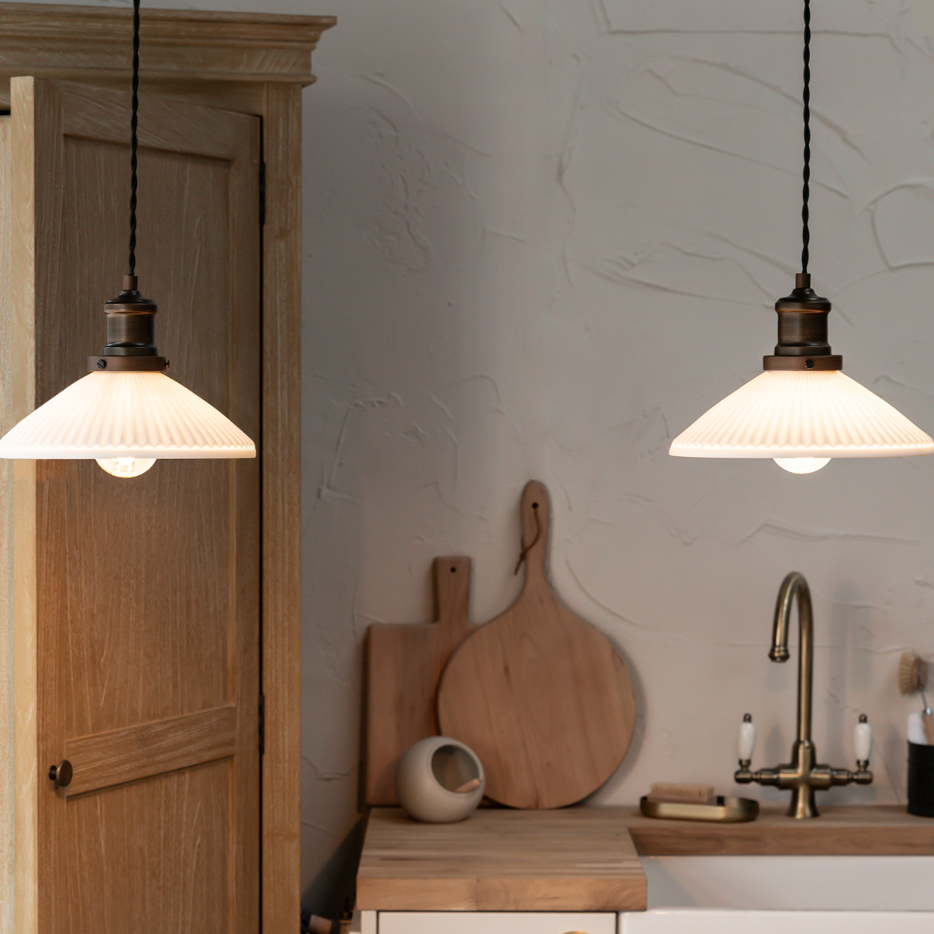 Ceramic and antique brass pendant lights.