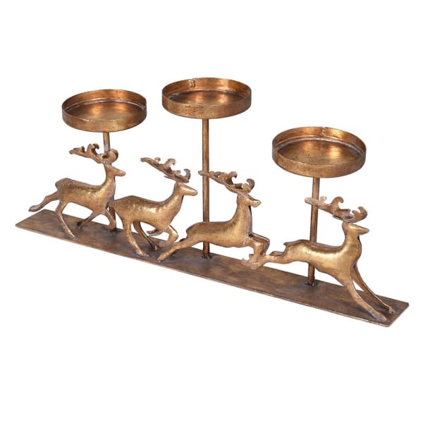 Gold candle holder with prancing reindeers.