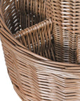 Close up of glass compartment on champagne wicker basket carrier with handles.