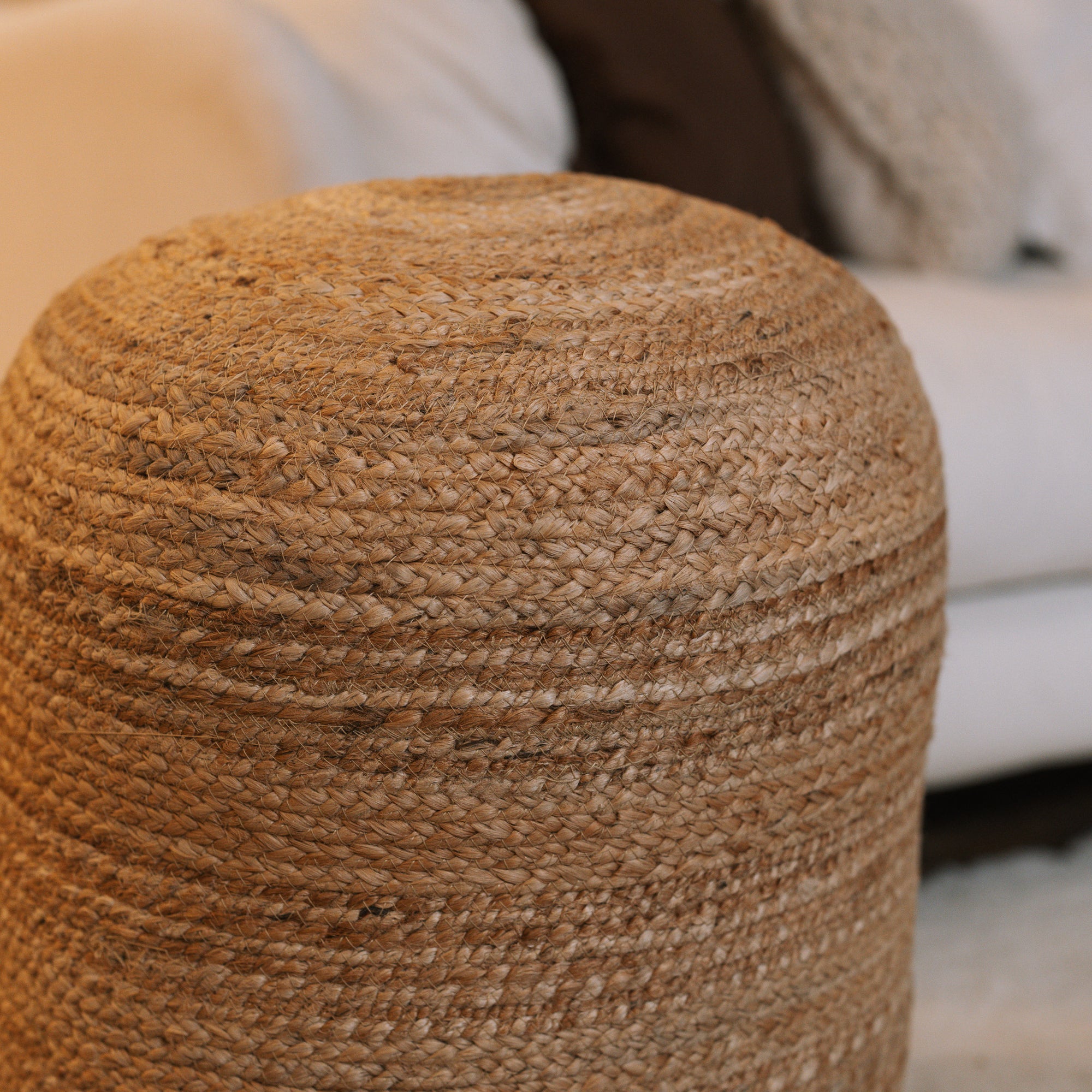 Detailed shot of Round jute pouf.