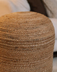 Detailed shot of Round jute pouf.