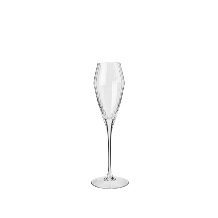 Clear ribbed champagne glass.
