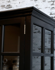 large black armoire cabinet.